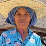 កម្មកររែកដីនៅទំនប់ម្លេច