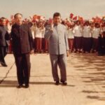 (Center, right): Pol Pot, Prime Minister and Secretary of Communist Party of Kampuchea (CPK) with Wang Dong Xing, Deputy Head of Chinese Communist Party’s Central Committee. (Behind Wang Dong Xing): Khieu Samphan, President of State’s Presidium of Democratic Kampuchea. (First from left): Hu Yao Bang, General Secretary of Chinese Communist Party’s Central Committee. (Second from left): Nuon Chea, President of People’s Representative Assembly and Deputy Secretary of Communist Party of Kampuchea. On Friday 16 November, 2018, the Khmer Rouge Tribunal convicted Nuon Chea and Khieu Samphan of genocide, crimes against humanity and grave breaches of the Geneva Conventions of 1949. The crimes were committed at various locations throughout Cambodia during the Democratic Kampuchea period from 17 April 1975 to 6 January 1979. The Trial Chamber sentencing both Nuon Chea and and Khieu Samphan to life imprisonment. Pol Pot became prime minister of Democratic Kampuchea in 1976 and resigned in 1979, but remained an active leader of the Khmer Rouge. He lived in exile, mainly in Thailand, until his death in Anlong Veng district, Oddar Meanchey province, on April 15, 1998. His body was cremated on 17 April, 1998. Source: Documentation Center of Cambodia’s Archives
